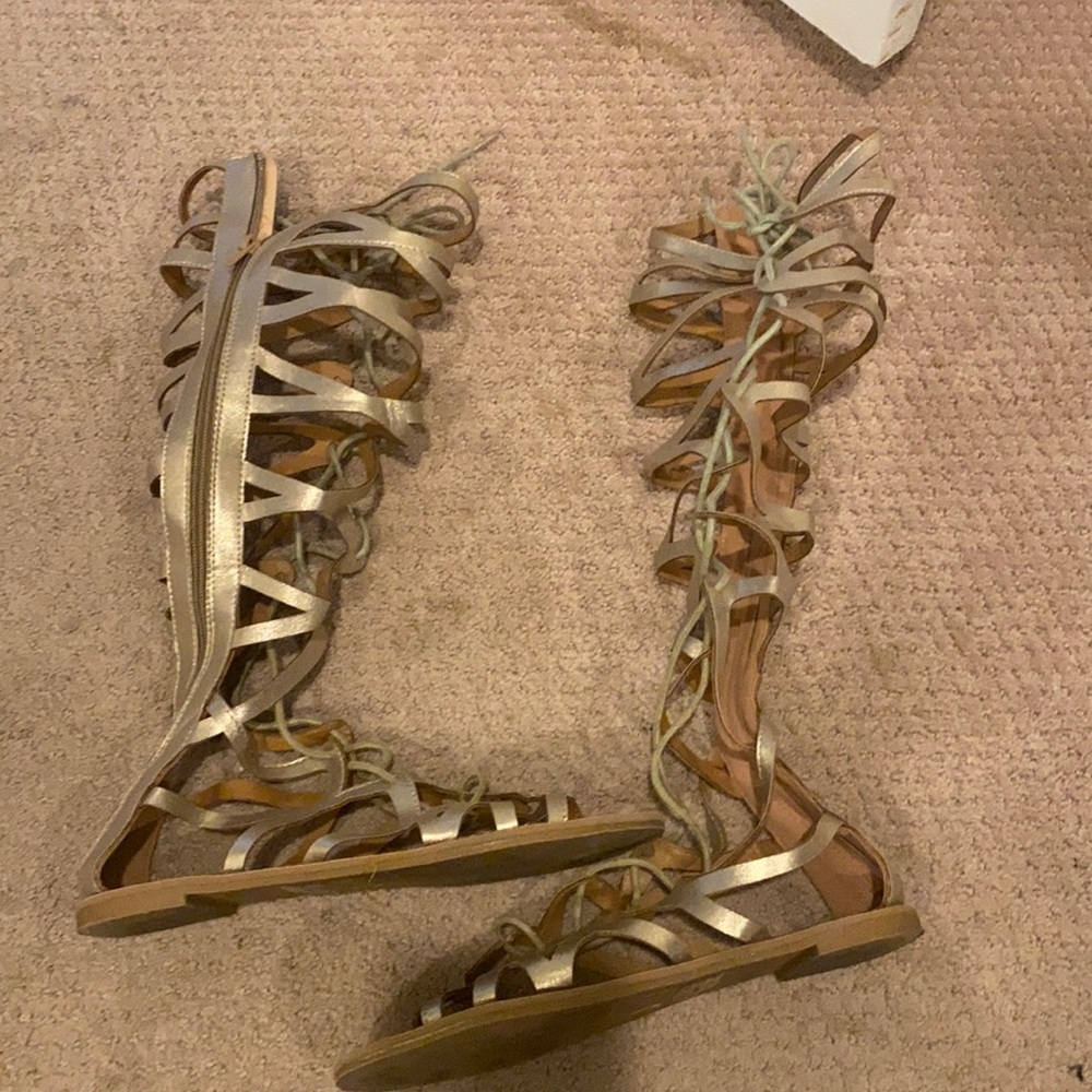 Thigh high gladiator sandals